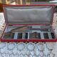 Set of 12 dessert forks and a cake server.