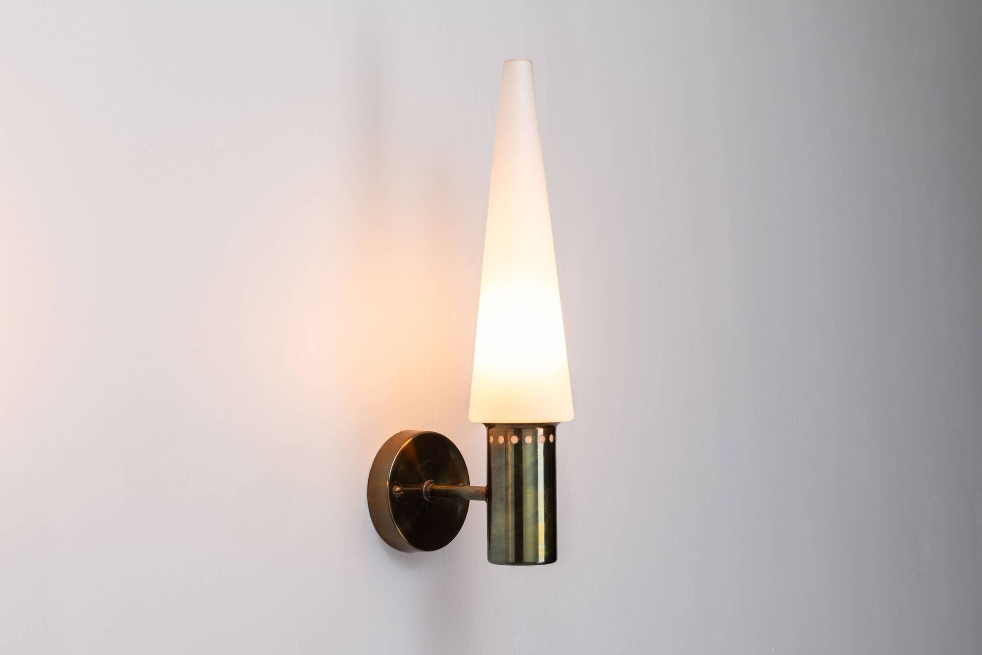 Set of two Hans Agne Jakobsson wall lamps with opal glass shades