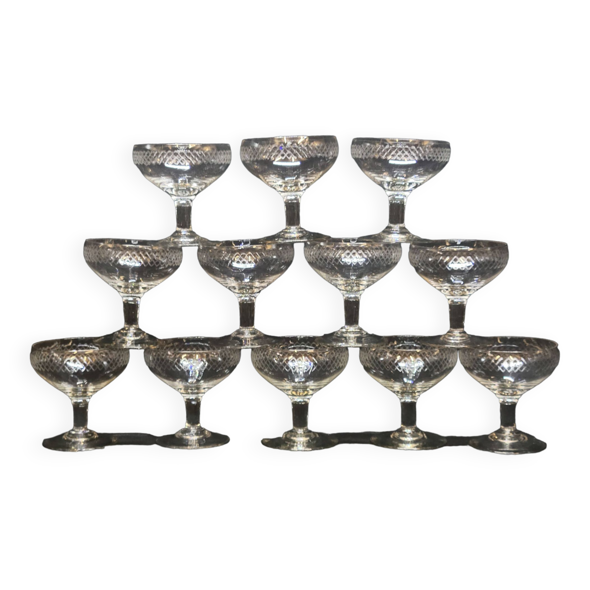 12 old champagne glasses in blown and engraved glass