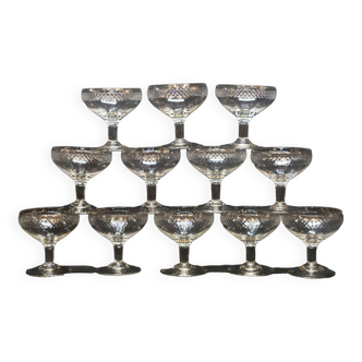 12 old champagne glasses in blown and engraved glass