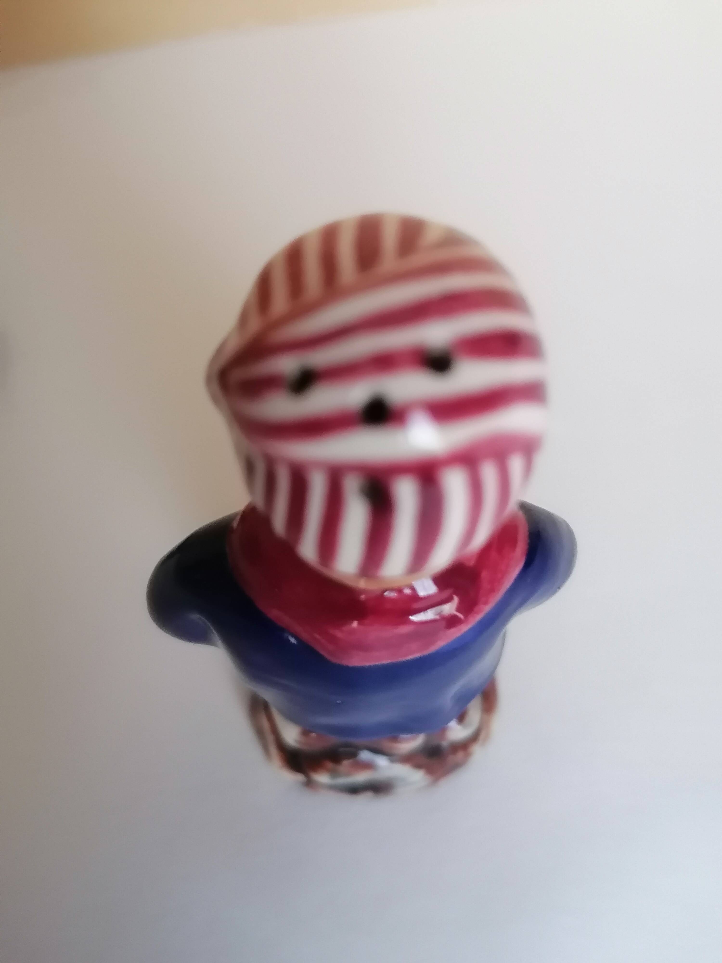 Breton salt and pepper shakers in a couple.
