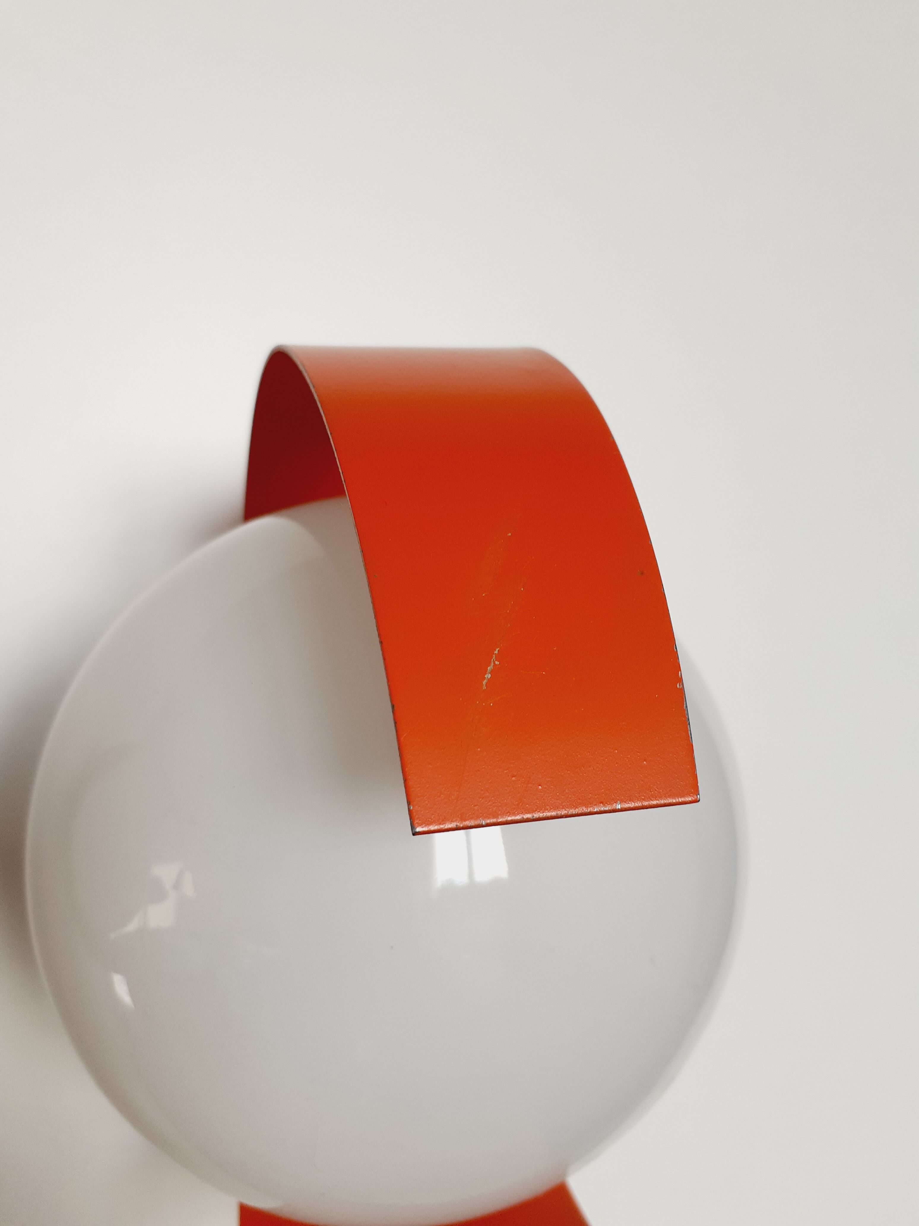 Pair of orange space age wall lamps