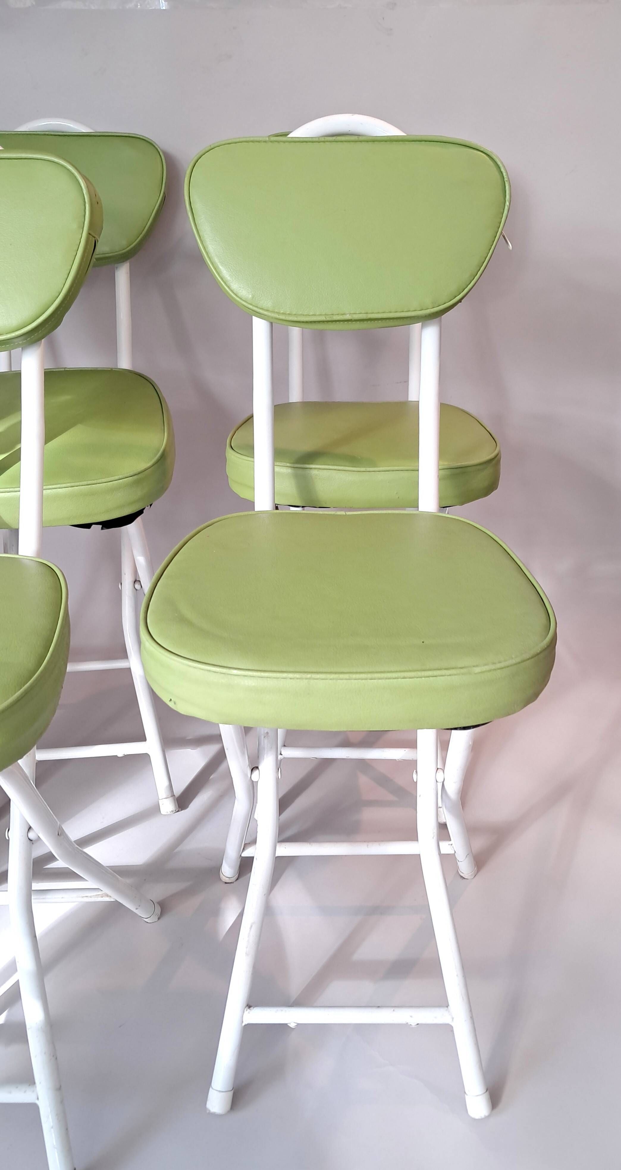 Set of 4 folding cocktail chairs in olive green faux leather from the 1970s.