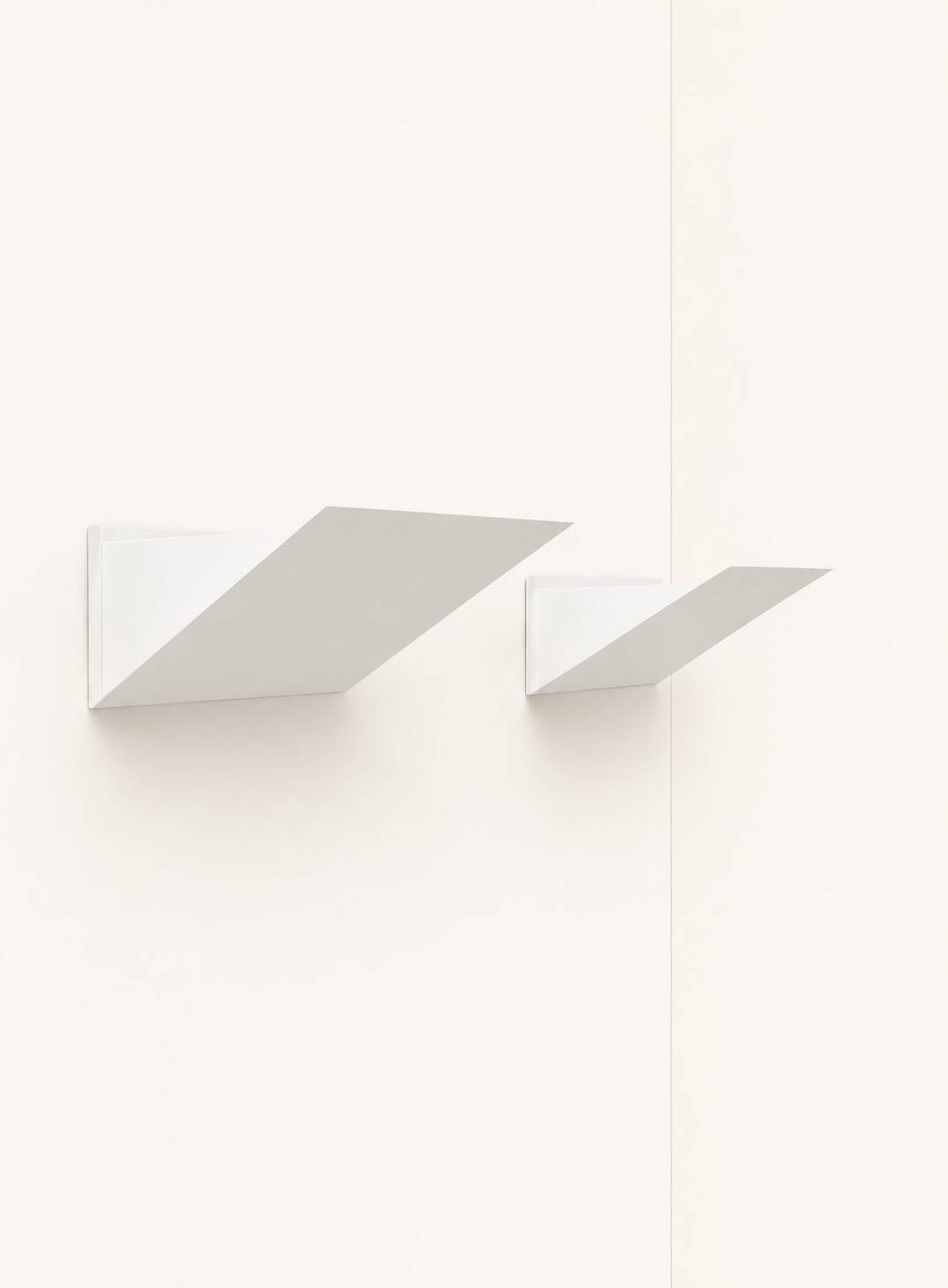 Pair of vintage wall sconces, matte white metal, France, 1970.