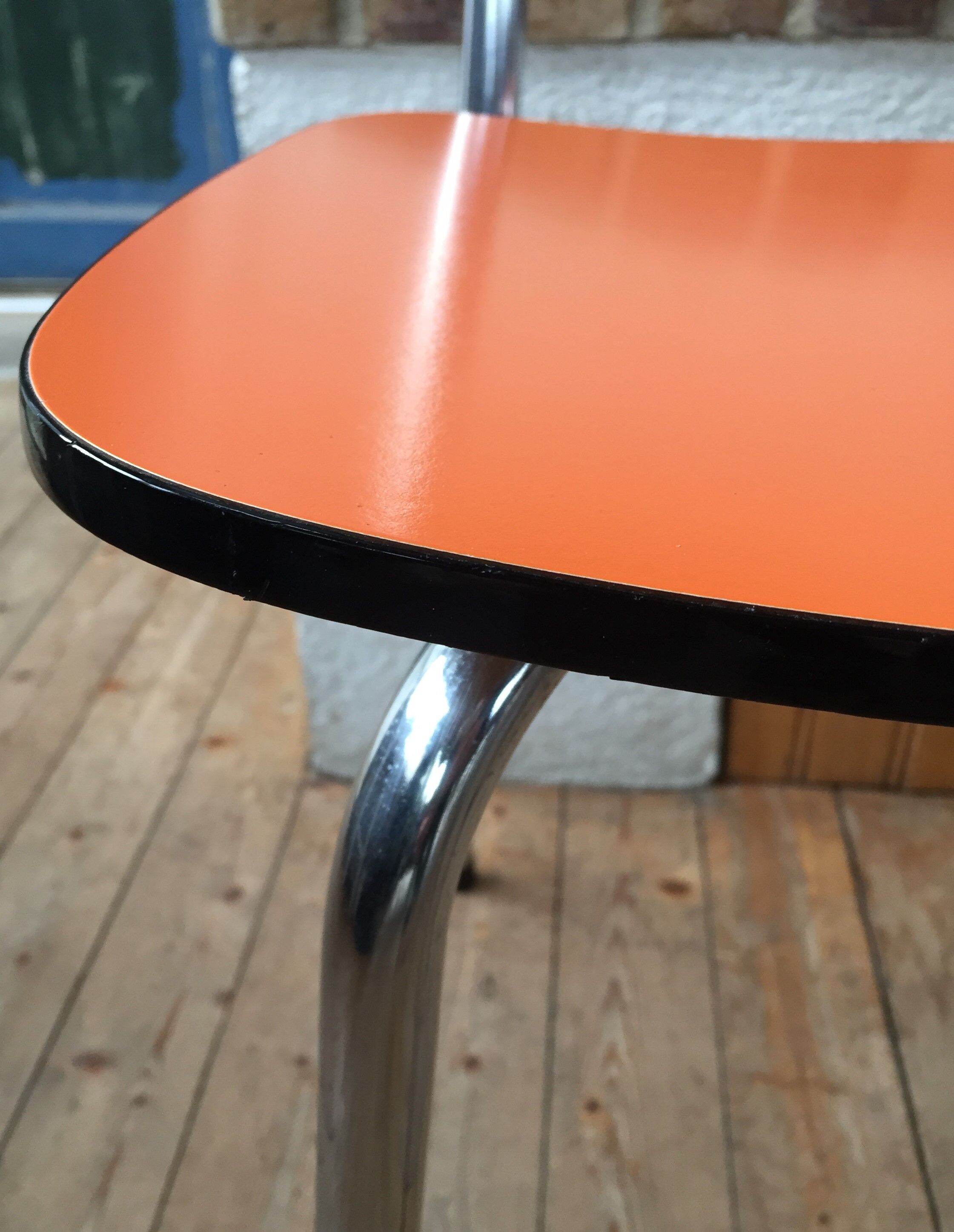 Lot of 4 vintage chairs in orange formica