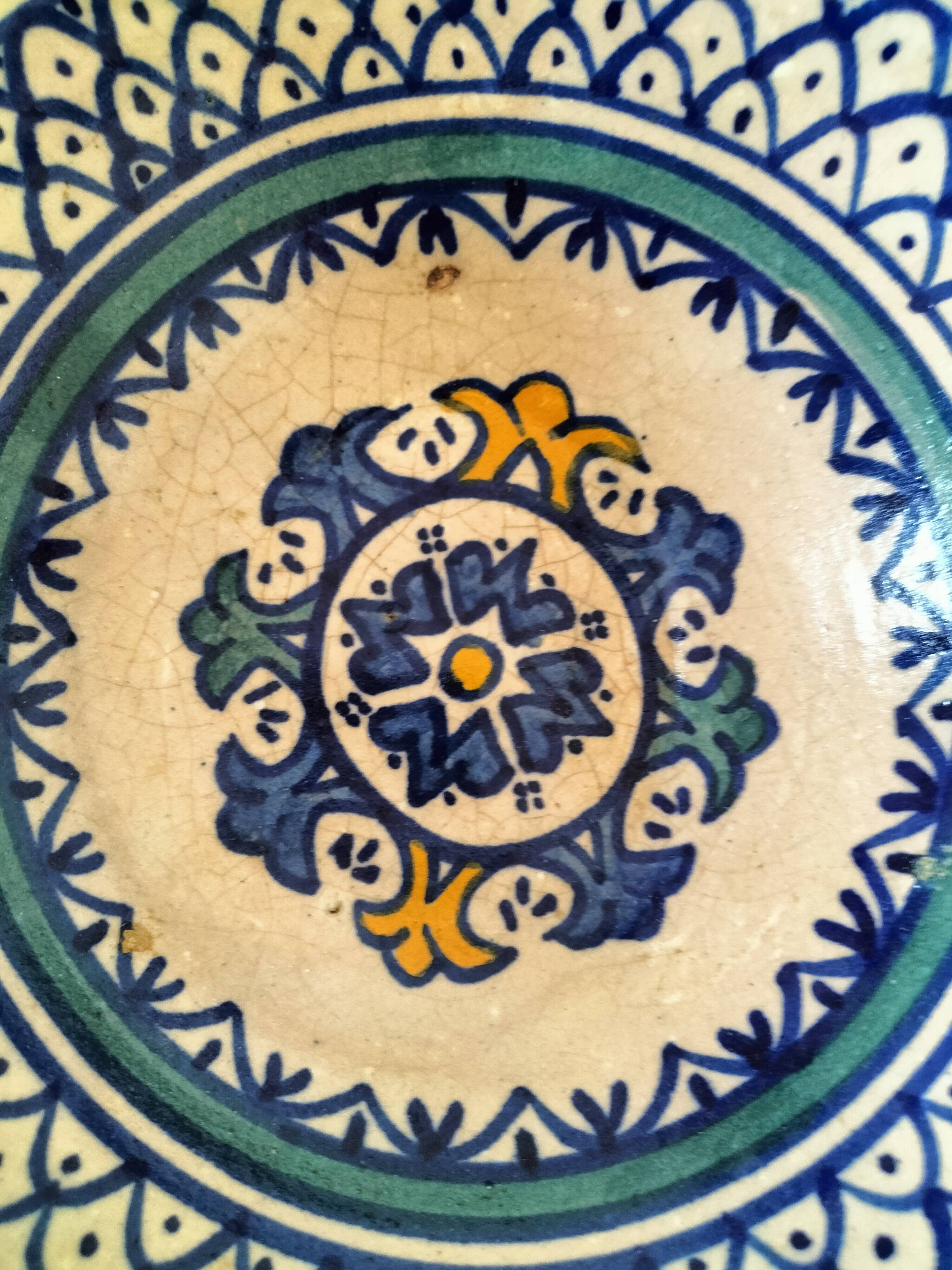 Set of 9 hand-painted Tunisian ceramics.