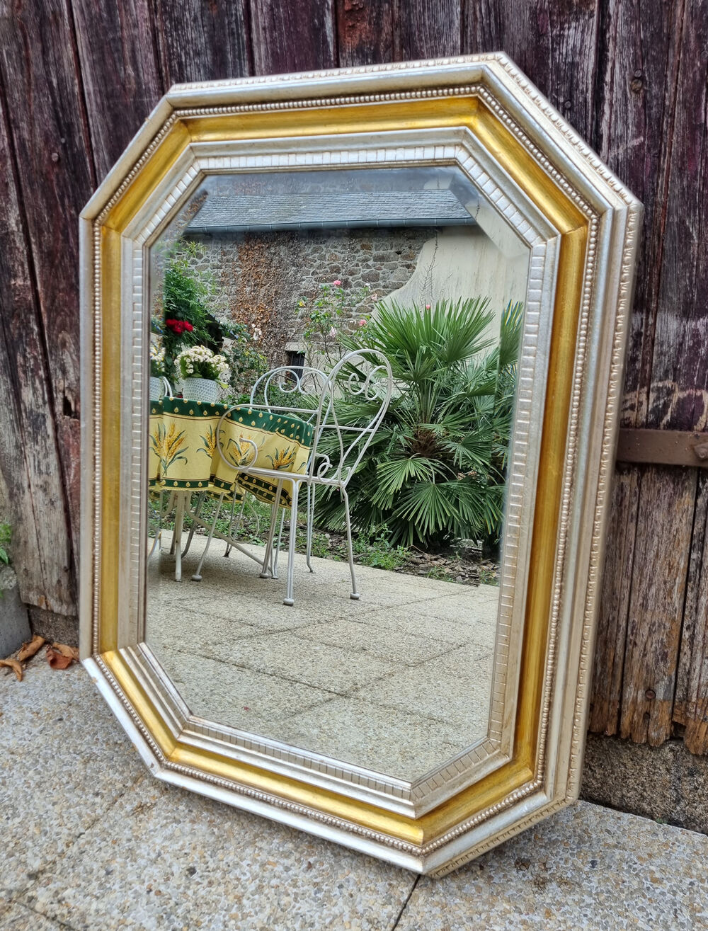 Octagonal mirror wood with frieze of oves, beveled mirror, 20s 66x86cm