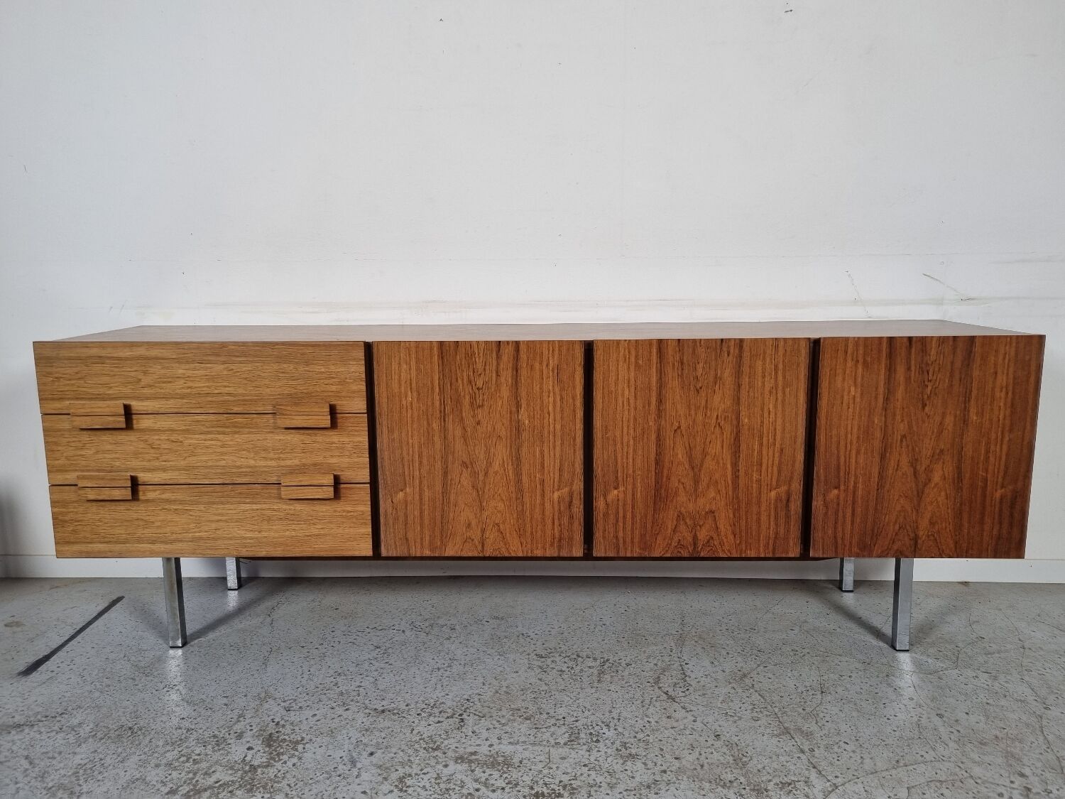 Scandinavian row in rosewood and chrome, 60s