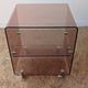 Pair of vintage smoked plexiglass bedside tables or accent furniture.