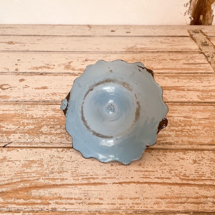 Blue enameled sheet metal candle holder