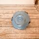 Blue enameled sheet metal candle holder