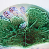 Asparagus plate in dabbling, with a leaf of green cabbage