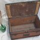 Former wooden travel trunk