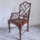 Fauteuil asiatique canné en bois à l'imitation du bambou