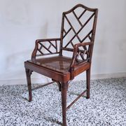 Asian canine armchair in wood in imitation of bamboo