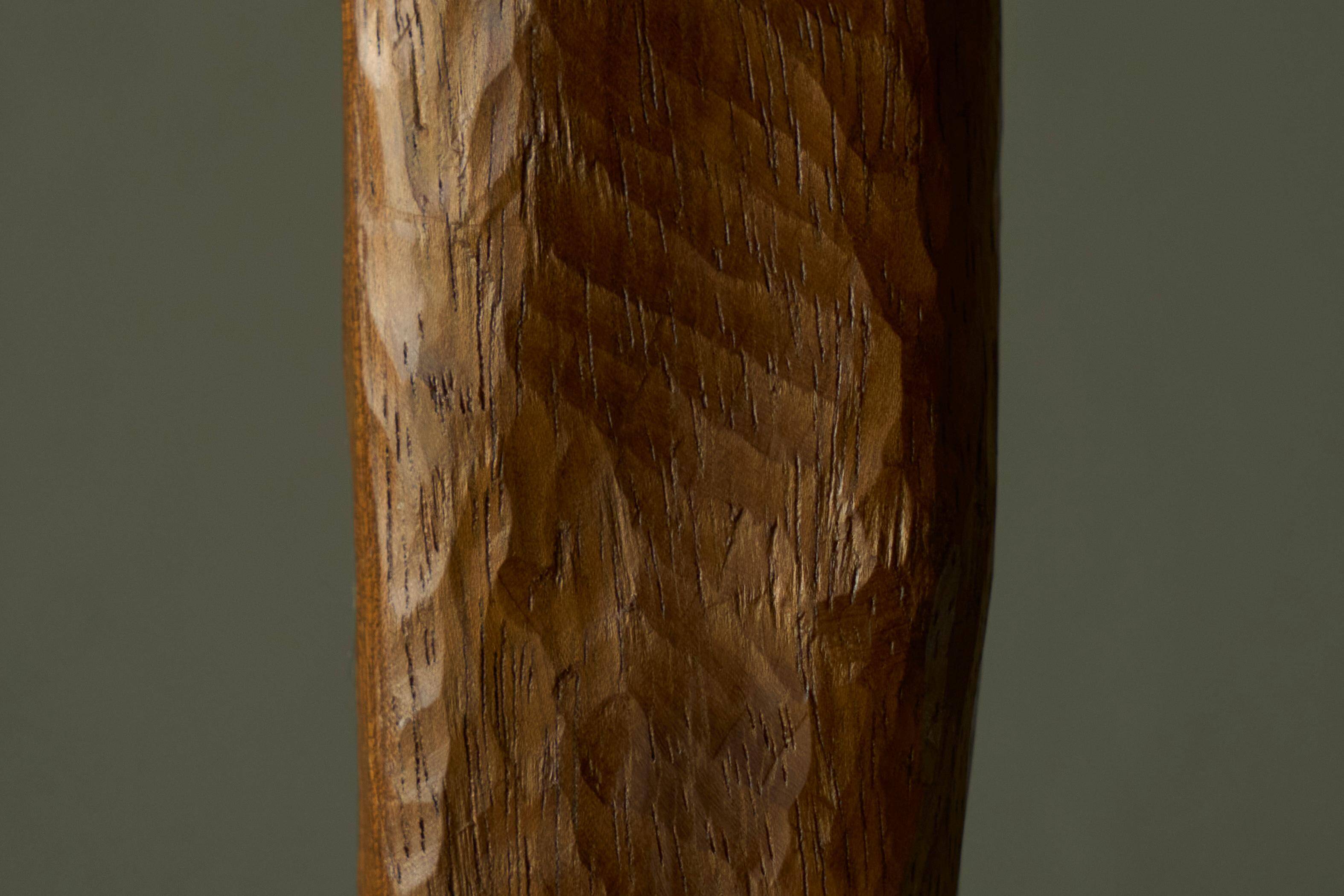 Sculpture of a woman and child in hand-carved wood, mid-20th century.