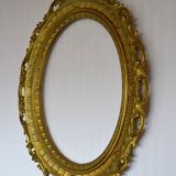 Oval frame in golden resin
