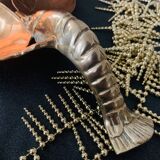 Integral brass lobster