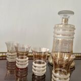 Carafe liqueur service with 8 gilded crystal glasses from the 1930s