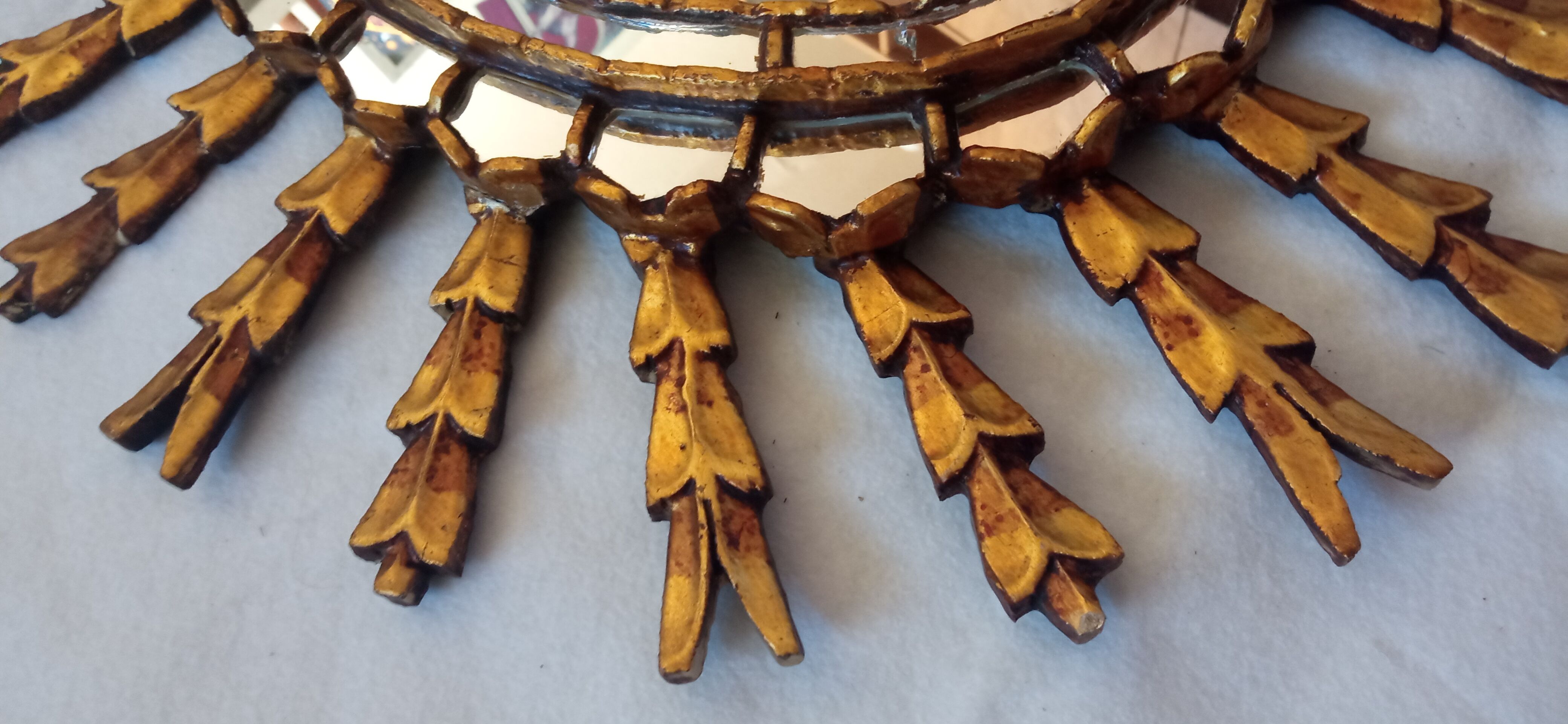 Sun mirror in gilded wood, 60x52 cm