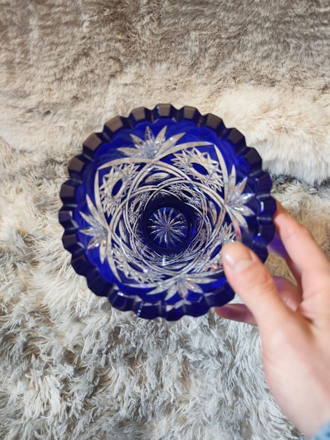 Bohemian vase in cut crystal with blue overlay.