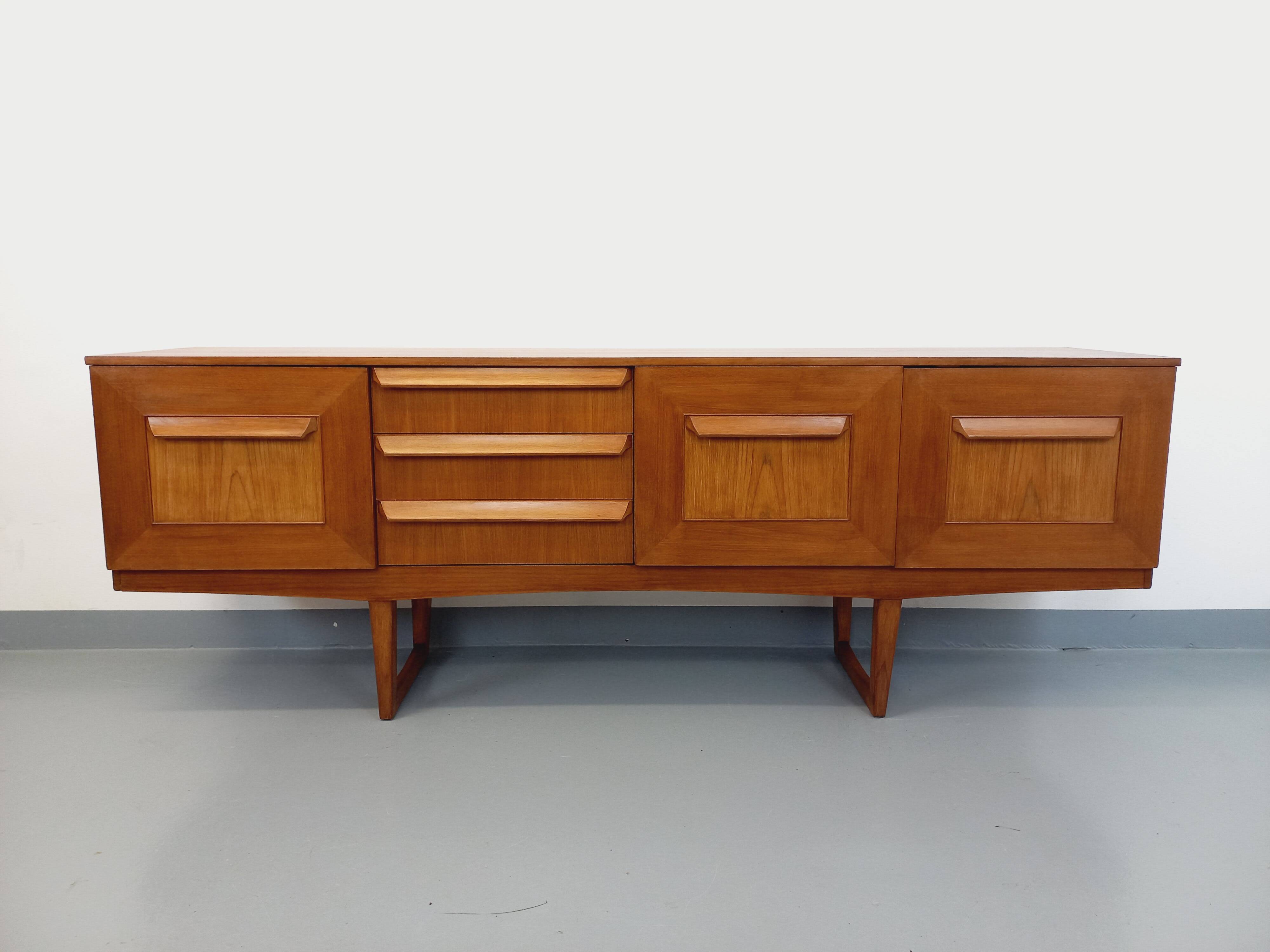 Vintage Scandinavian style sled foot sideboard in teak from the 60s