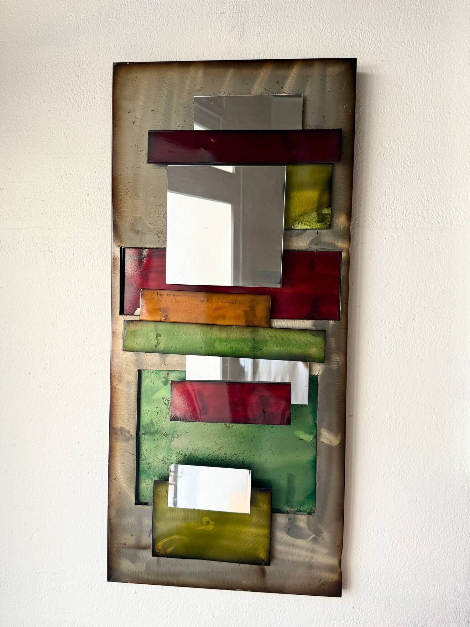 Large metal "polychrome" mirror — 1970s