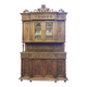 Art Nouveau buffet in carved oak with grapevine cluster decoration.