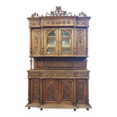 Buffet époque Art Nouveau en chêne sculpté à décor grappes de raisin vigne