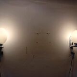 Pair of opaline chrome wall lights from the 70s.
