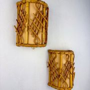 Pair of mid-century rattan wall sconces, circa 1970s, Italy