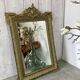 Antique mirror with a pediment
