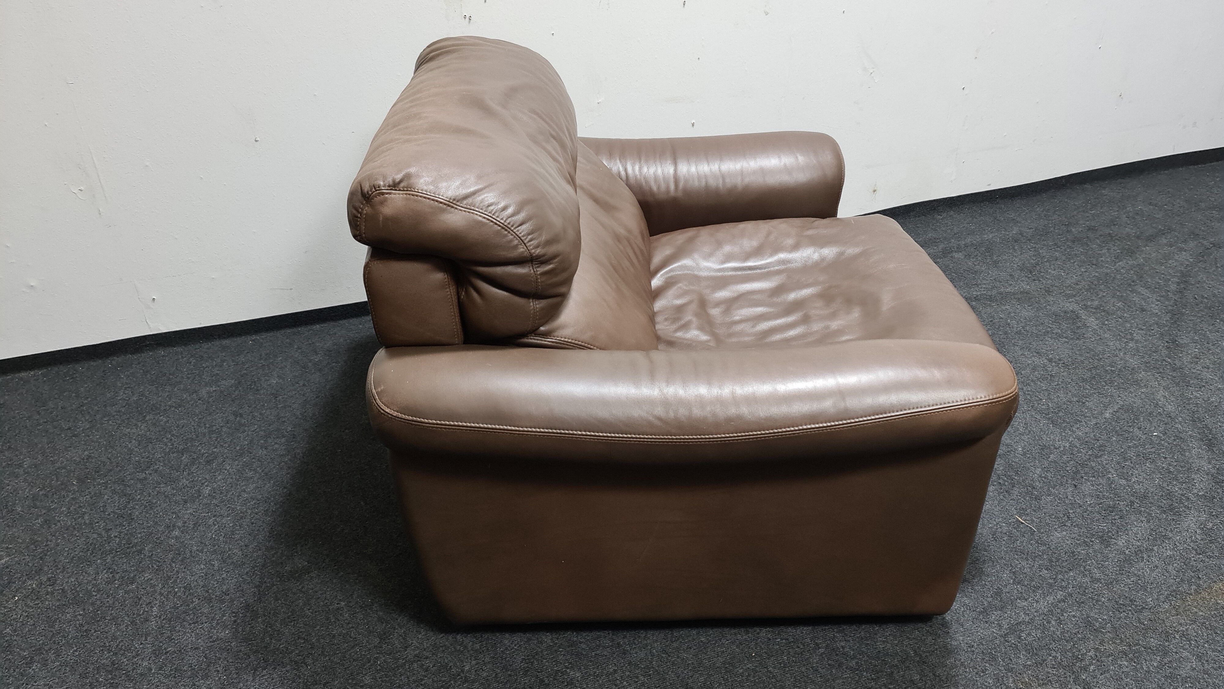 Fauteuil Rolf Benz en cuir brun vintage