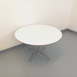 Vintage Eames round table for Vitra in white melamine, wood, and metal.