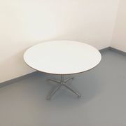 Vintage Eames round table for Vitra in white melamine, wood, and metal.