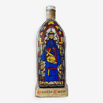 Vintage bottle with stained glass decoration