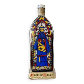 Vintage bottle with stained glass decoration