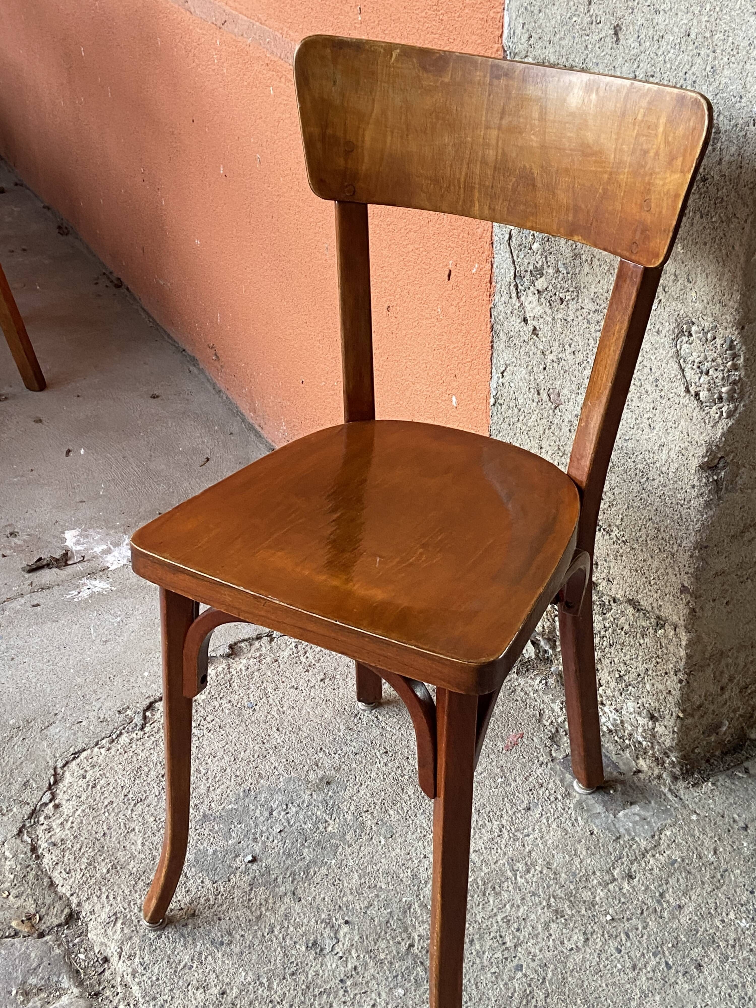 Set of 30 mismatched bistro chairs French Restaurant curved wood