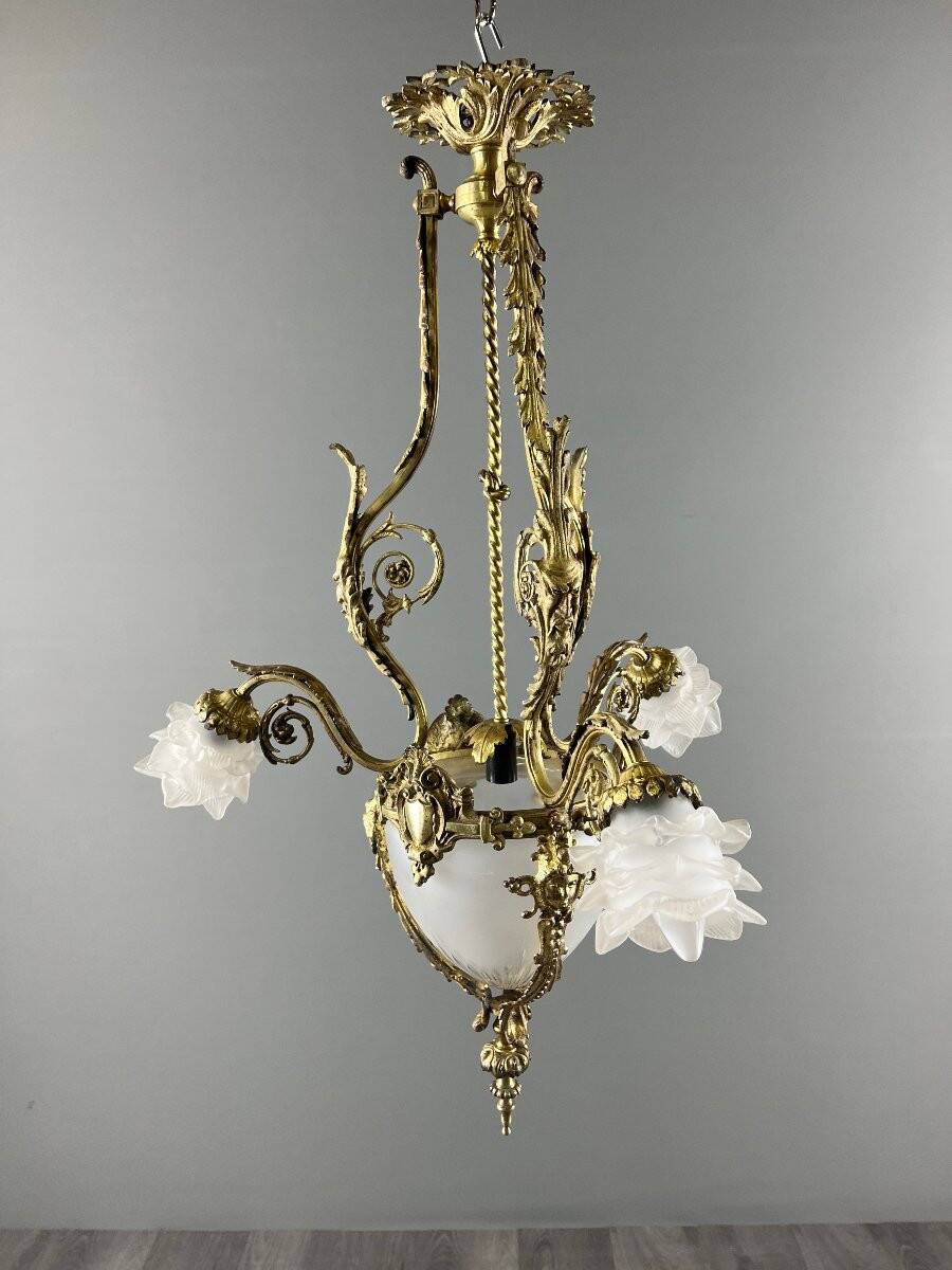 Louis XV style chandelier in bronze and glass, 19th century