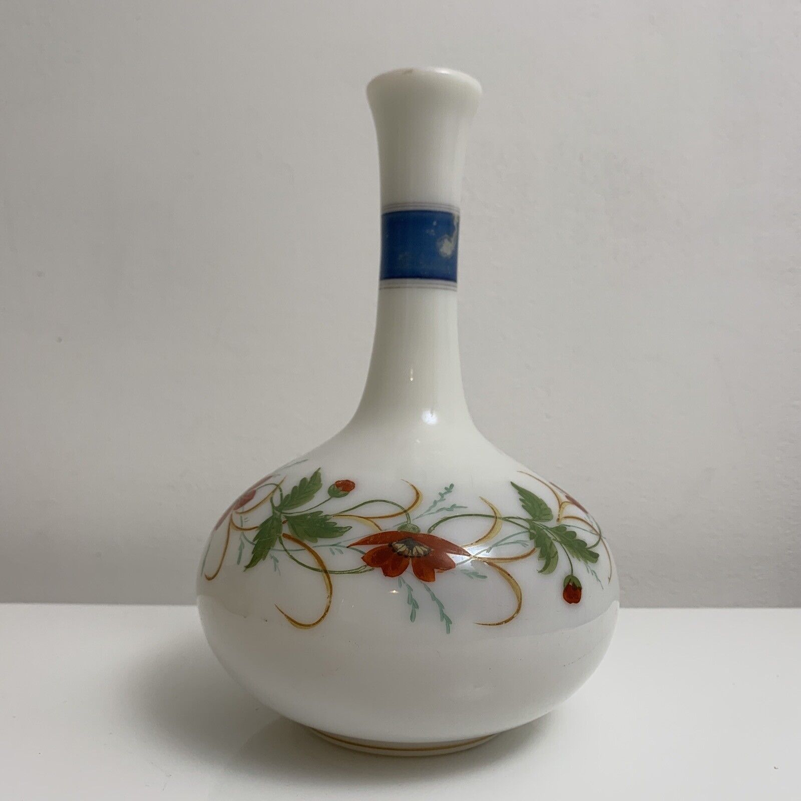 Old vase in opaline floral decoration painted