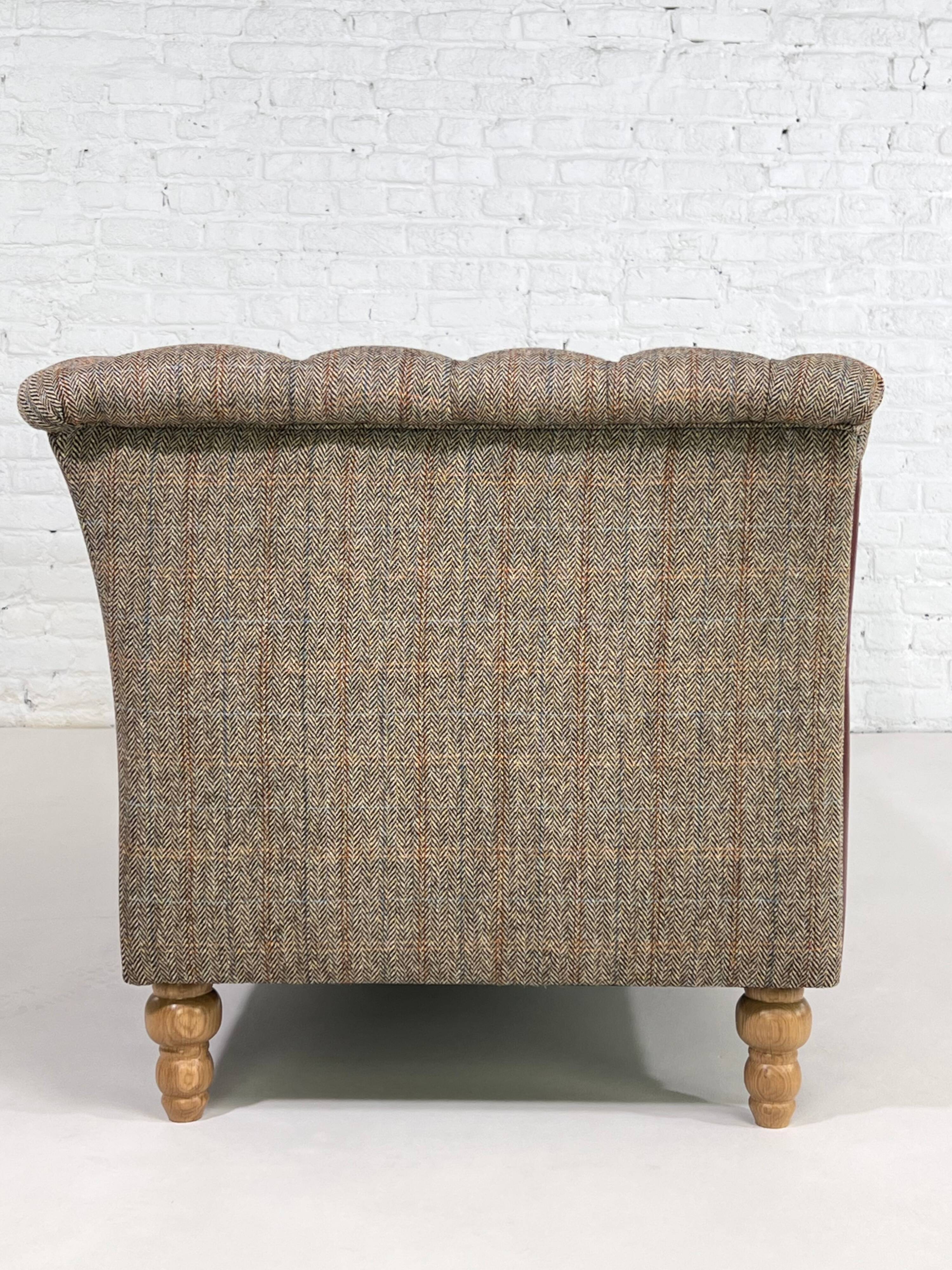 Chesterfield sofa in leather, fabric and wood