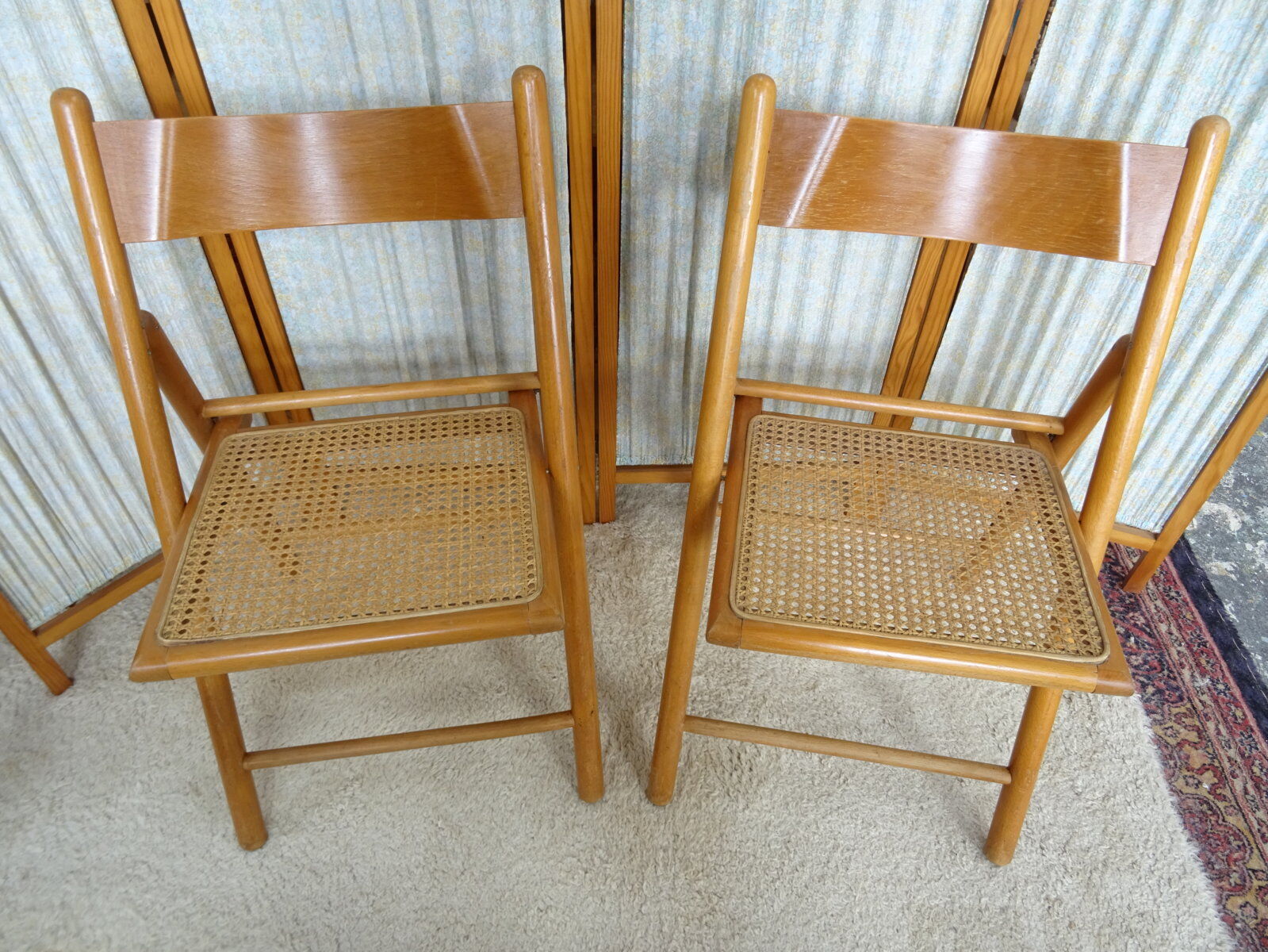 Pair of canned folding chairs