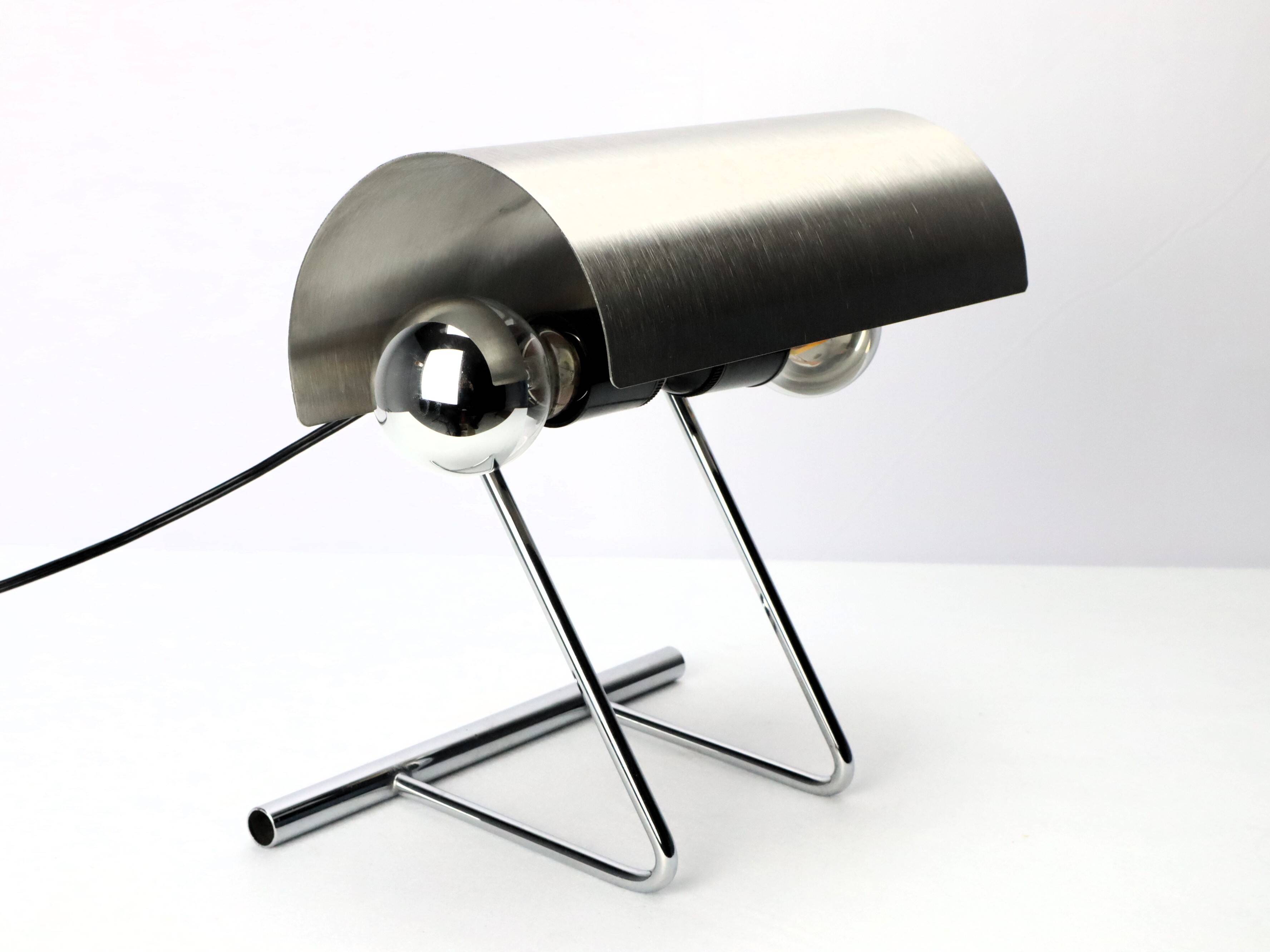 Stainless steel lamp from the 1970s in the style of François Monnet.