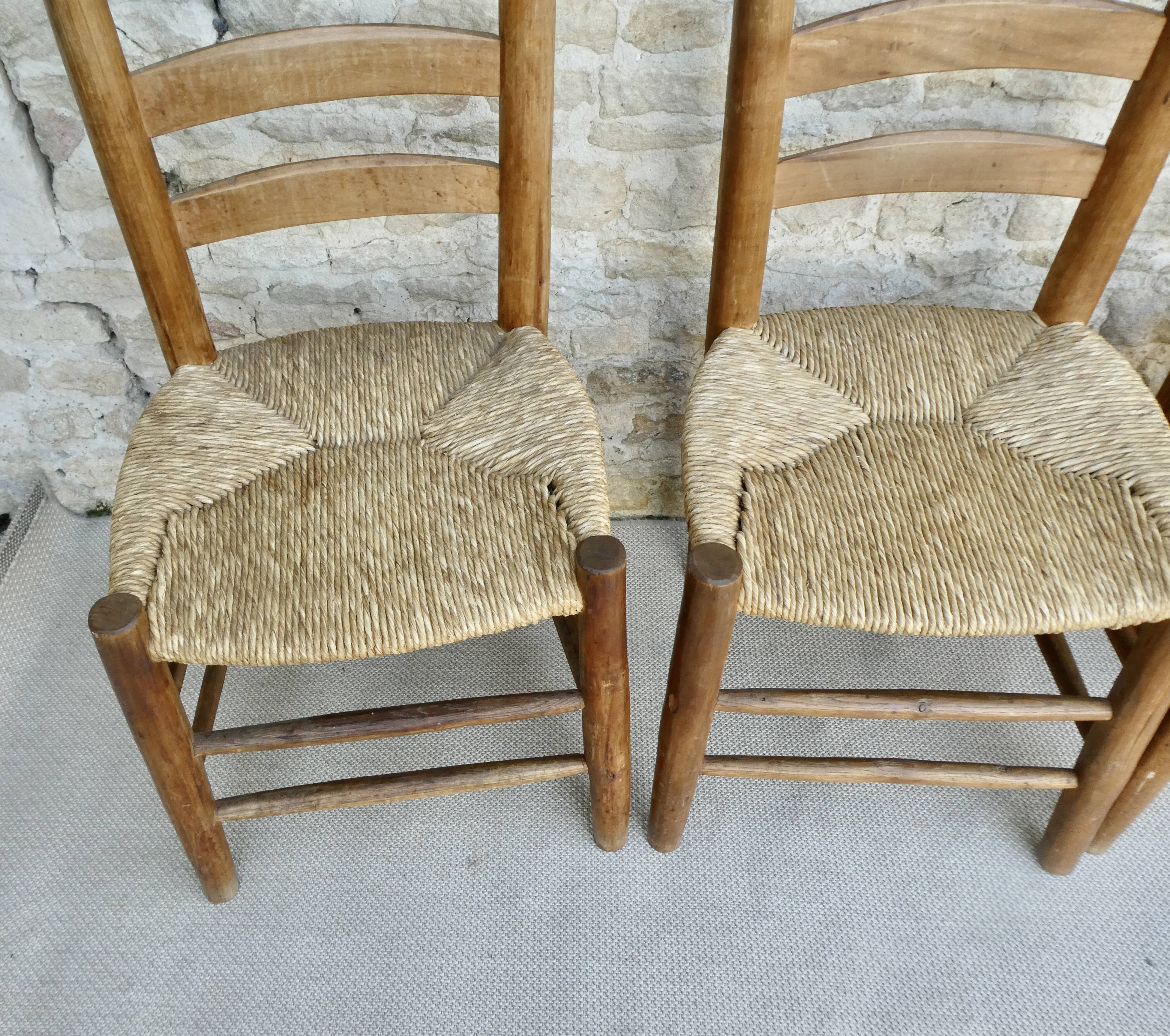 Trio of wooden chairs and mulched seat