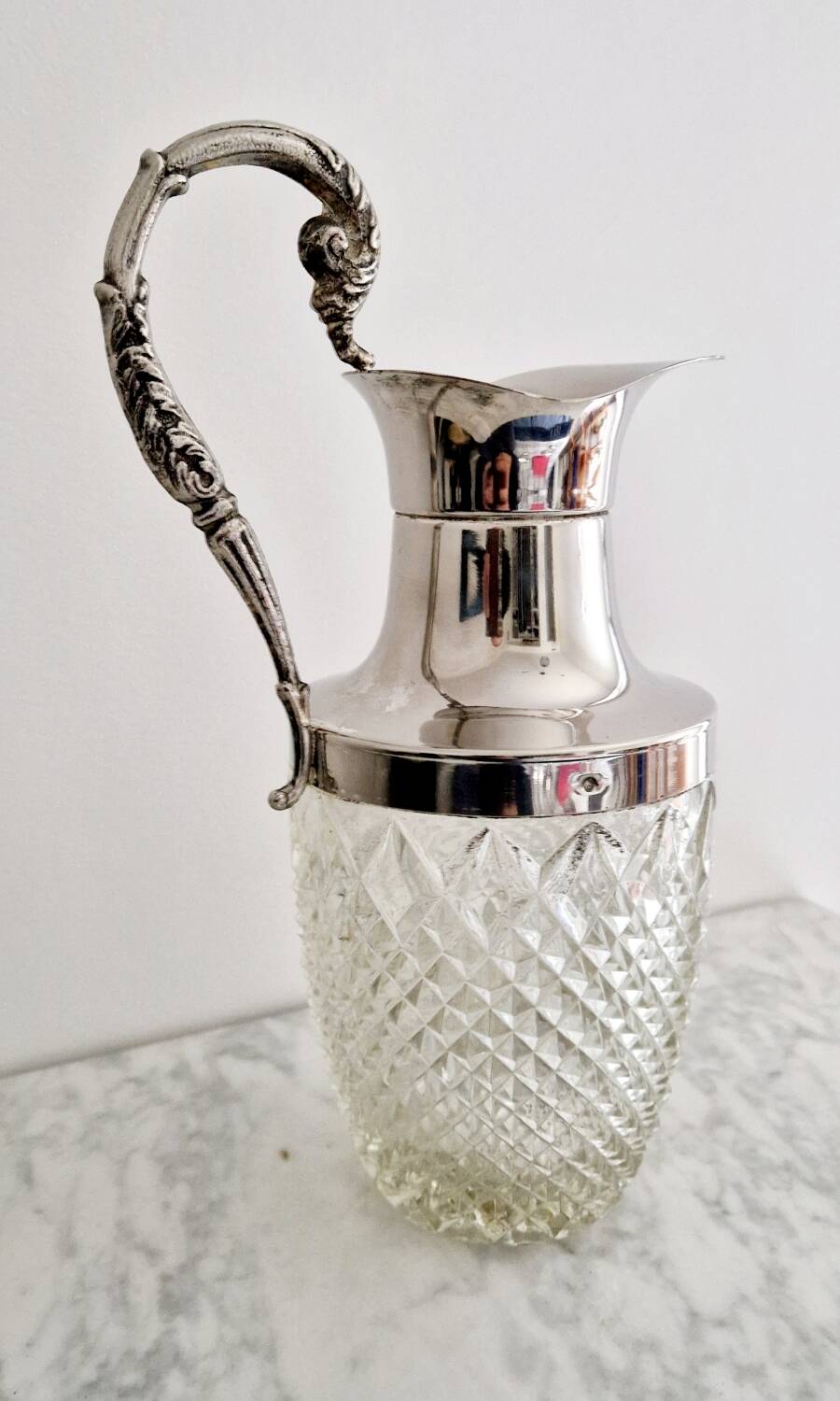 Glass and silver-plated carafe