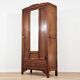 Art Deco wardrobe in solid wood with mirror from the 1920s.