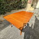 Scandinavian extendable dining table in teak veneer.