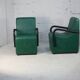 Pair of armrest heaters. Steel and green imitation leather. France, circa 1980