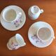 Set of 4 cups and 2 under cups High porcelain Berry "Ropes"