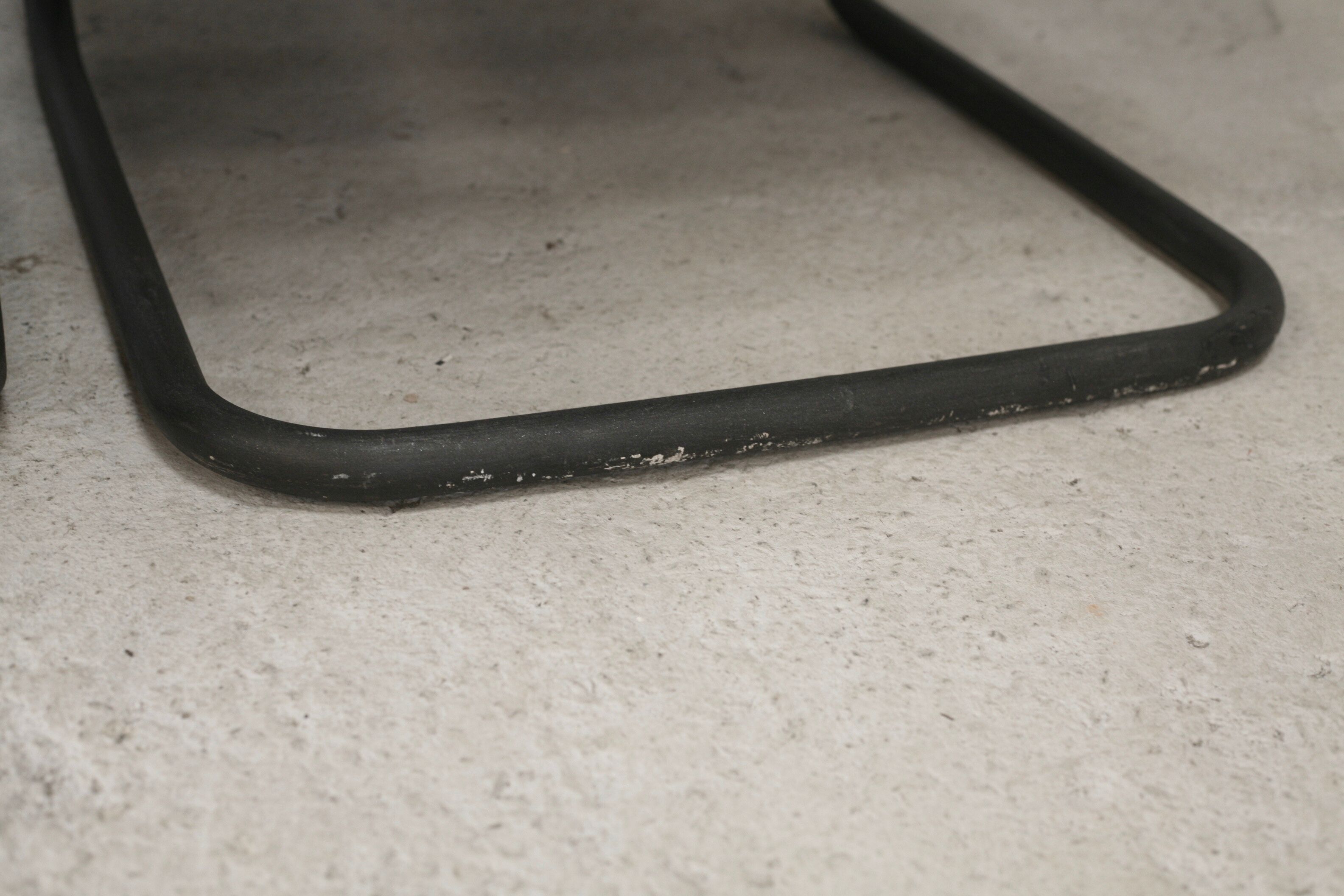 Pair of Prisunic edition armchairs, tubular steel and foam cushions, France, 1973